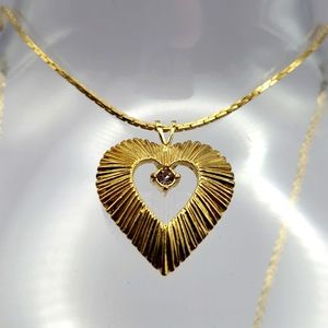 Heart chain gold tone open heart pendant